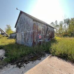 Would have liked to peeked into these old buildings, but in shorts didn't want to bushwack!