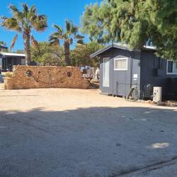 Cure beach cottages at Denham.