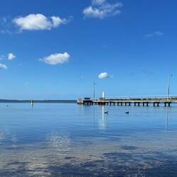 The bay and its mirror like calm