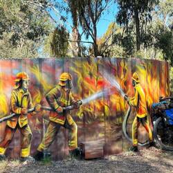 Water Tank to aid fire fighting in the rural areas - decorated with the brave firefighters