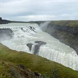Gullfoss waterfall. It was mighty. Roaring clouds of aerated water spewed into the air. Magnificent.