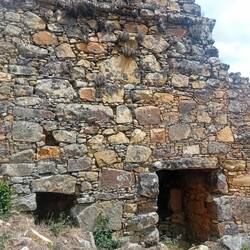 A side building showing the original stonework