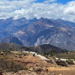 Some bigger mountains are now in view