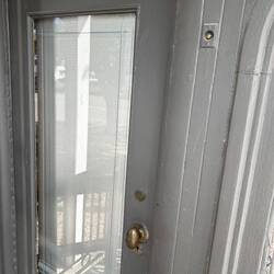 Open platform (Observation) end, showing original cut glass in window plus a porter call button