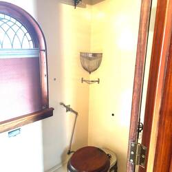 The car did not have retention toilets in those days. Lift the lid and see the ballast!