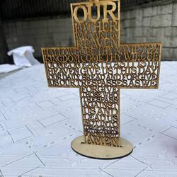 Beautiful cross carved with the Our Father