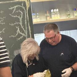 Chris helped to make the stuffed grape leaves