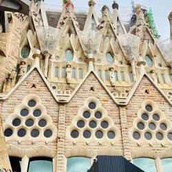 The fruits on the tops of the building!