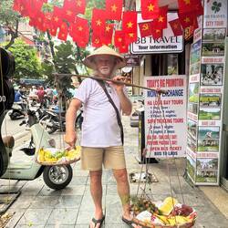 Trying out the fruit lady's job.