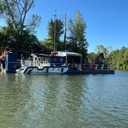 Another dredge barge standing by
