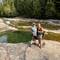Me and Rosanne in front of one of the boiling pots