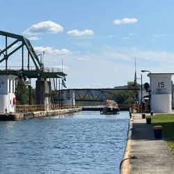 Sail boat coming out of lock 15.