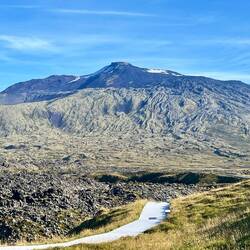 Lava flow frozen into the mountain side. This is unique as the flow usually erodes with time.
