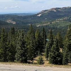 Looking SW on Battle Pass. Two brief stretches of highway behind can be seen.