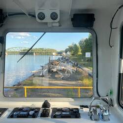 View of tug helm and view of barge