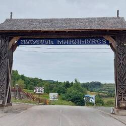 Welcome to Maramures; wooden gate structures are traditional entry points to villages etc