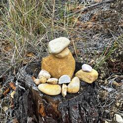 Seen periodically. As pilgrims come along they add to it. Mine is the white/grey bottom middle.