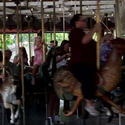 Jill rides the carosel
