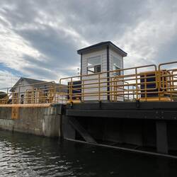 gate shack lock 6. You can see the vertical row of lights just to the left of the shack.
