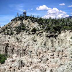 Hiking on rough terrain, through nature.
