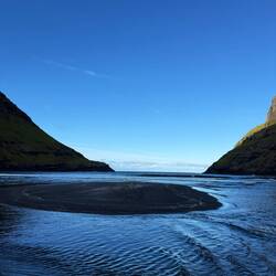 At the beach, the tide is already swallowing some of it