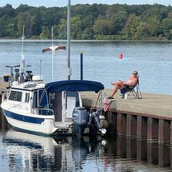 Rosanne relaxing on the lock approach wall.
