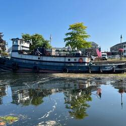 I believe this is a private tugboat. It was at the south end of the Waterford Welcome Center dock