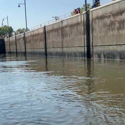 Lock is almost filled, so water becomes less turbulent.