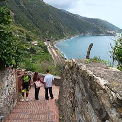 Walking down many steps from Corniglia to the train station