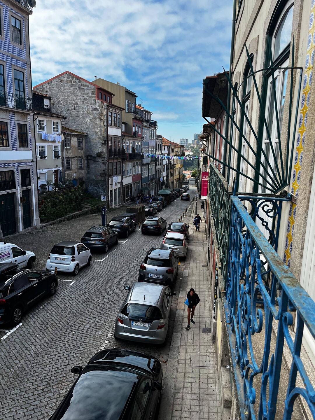 We had to move rooms for one night we now have a balcony. View down our road