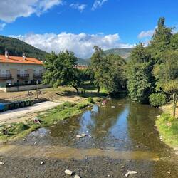 Pilgrims enjoying the river in Zubiri.