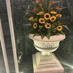 Sunflower arrangement beside Reception Desk