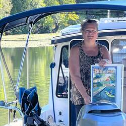 Rosanne wanted her picture with this poster we picked up at the Canajohire library earlier.