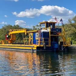 One of several Canal authority tugs/barges.