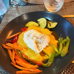 A meal I had last night. It was sweet potatoes with cooked vegetables and a poached egg.