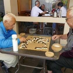 Due to their high-rise apartments people use parks and cafes to socialize.