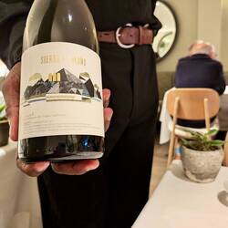 The second glass of red wine.