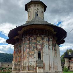 Moldovita Monastery; view on entry - the Eastern wall is weathered