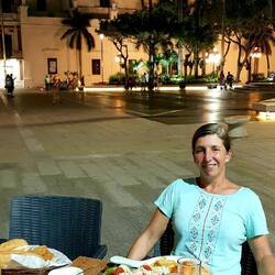 Dinner in the central square with the cathedral in the background.