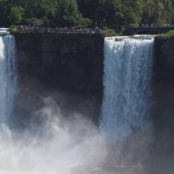 People on the Amarican side viewing the American Falls from the midst of the falls