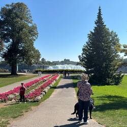 Jill walking Indy toward the river front.
