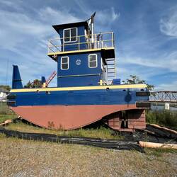 One of the Canal tug boats in Fonda. Interesting hull shape.