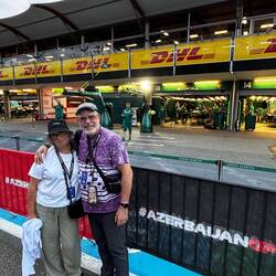 In front of the Stroll's pit. He's a Canadian driver