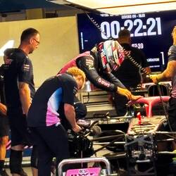 Getting into his car. Note the countdown clock for curfew.