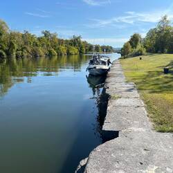 C-Traveler docked against the wall for Enlarged Erie Canal lock 34