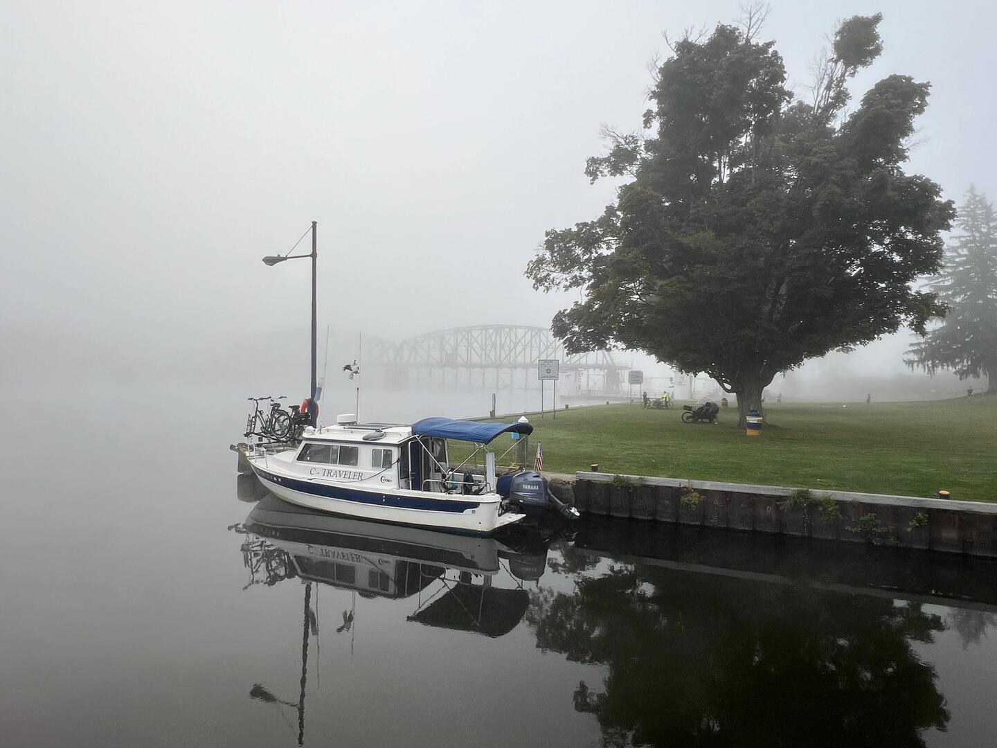 Foggy morning at lock E15. Bikers and tents mostly gone