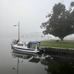 Foggy morning at lock E15. Bikers and tents mostly gone