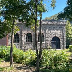 Old power house. Says Utica Gas and Electric over door.