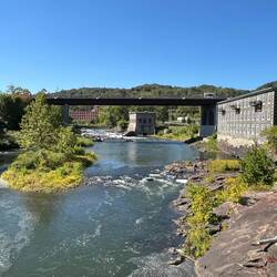 Mohawk River in Little Falls. Old power house and Gilbert Knitting Mill.