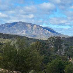 Wyndham has a stunning backdrop of Jingera rock, a sheer granite rock face.